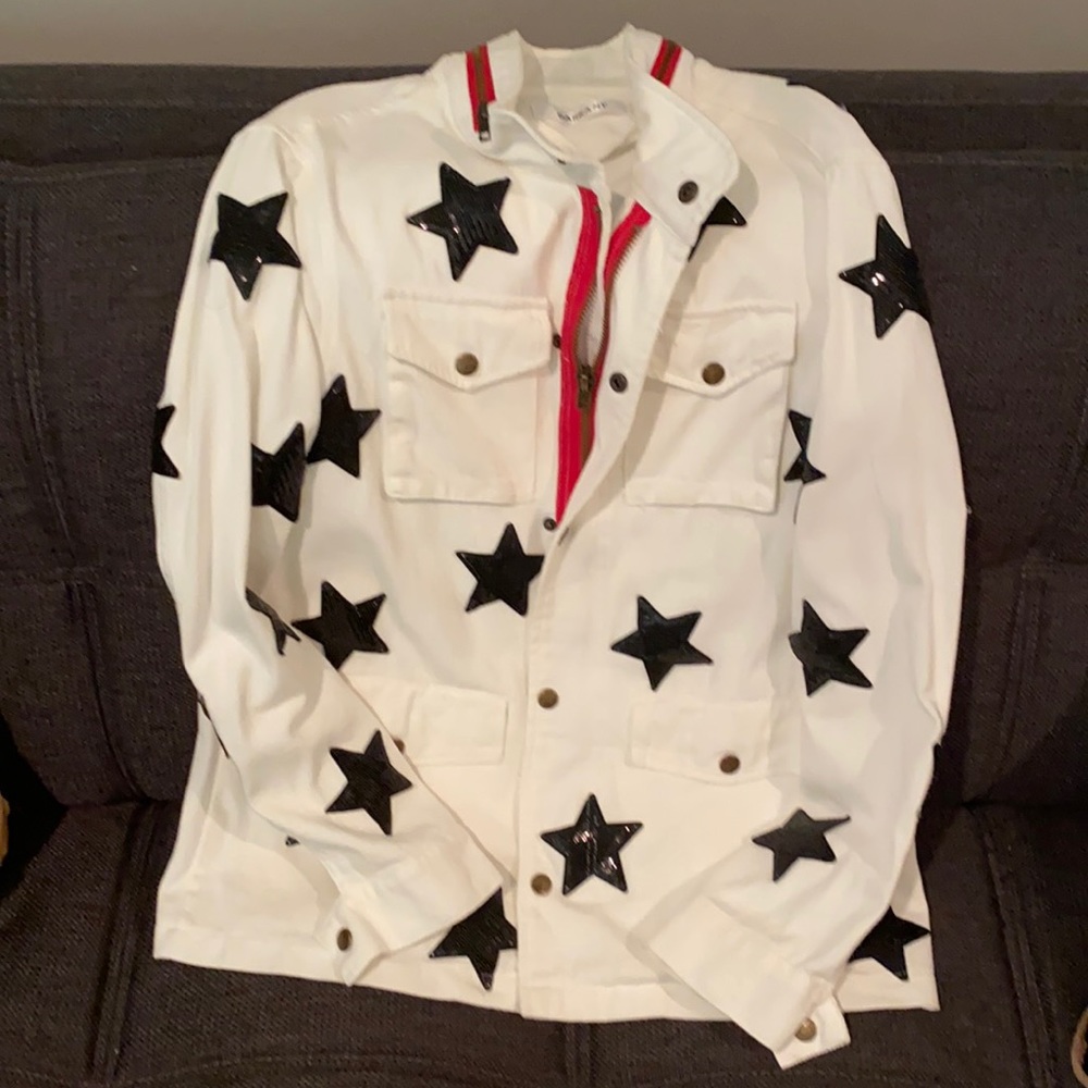 Denim jacket w/red accent and blk sequin stars.